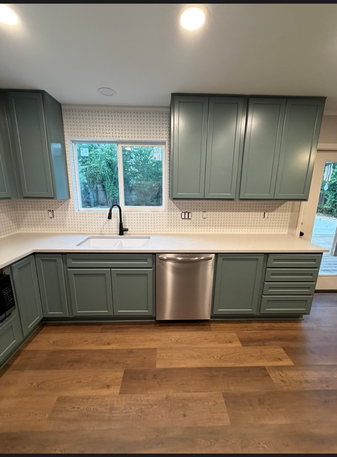 Warm remodeled kitchen with modern finishes